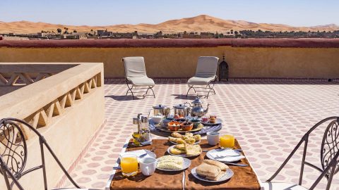 Breakfast at Riad Dar Hassan Terrace with view to Erg Chebbi